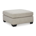  Manufacturer Color_Pebble -- Signature Design by Ashley Mahoney Fabric Ottoman IMAGE 1